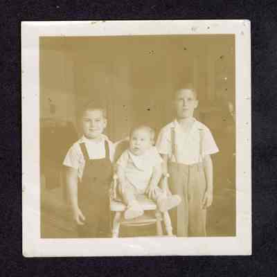 Photograph of three young boys, undated