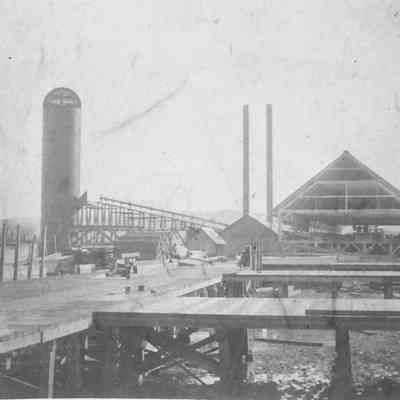Photograph of a lumber mill from the west end view