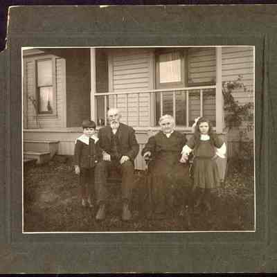 Photograph of Rhoda and Ira Higgins with two children