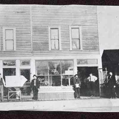 Photograph of Men Outside a Business on Main St, Springfield, Oregon