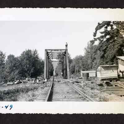 Photograph of men working on a rail line, 1949.