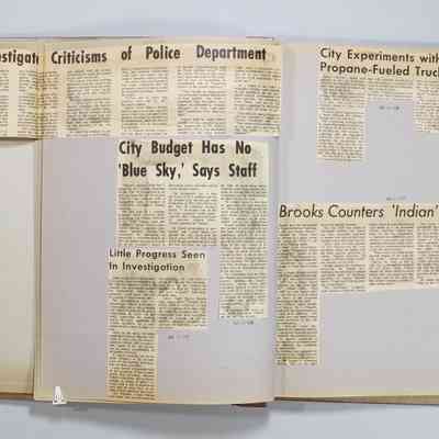 Pages 10-11 newspaper clipping unfolded