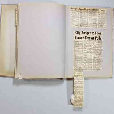 Pages 20-21 newspaper clipping unfolded