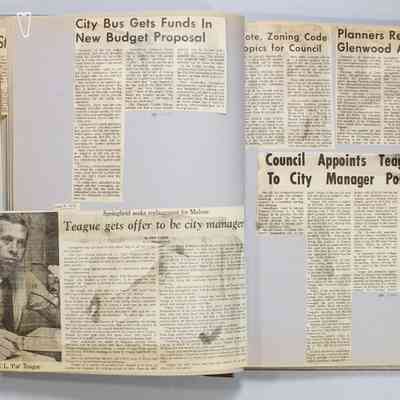 Pages 22-23 newspaper clipping unfolded