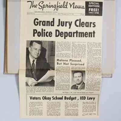 Pages 26-27 newspaper clipping unfolded