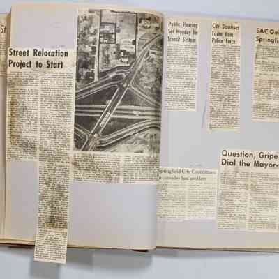 Pages 30-31 newspaper clipping unfolded