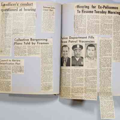 Pages 48-49 newspaper clippings unfolded