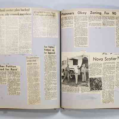 Pages 58-59 newspaper clipping unfolded