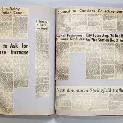 Pages 62-63 newspaper clippings unfolded