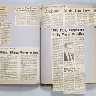 Pages 64-65 newspaper clippings unfolded