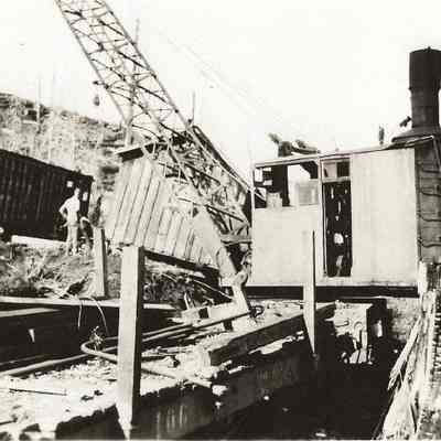 Photograph of moving parts of a house into a clearing at Booth-Kelly Camps above Wendling, Oregon, 1935