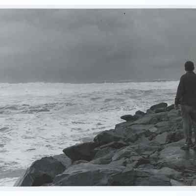 Photograph of a person on the shoreline, Oregon