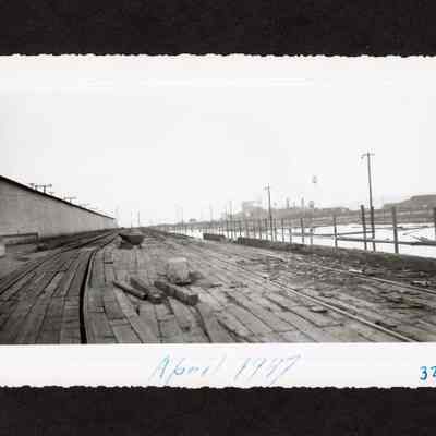 Photograph of rail dock by pond at Booth-Kelly Lumber Co.