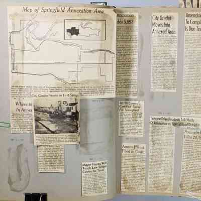 Pages 26-27 loose newspaper clipping
