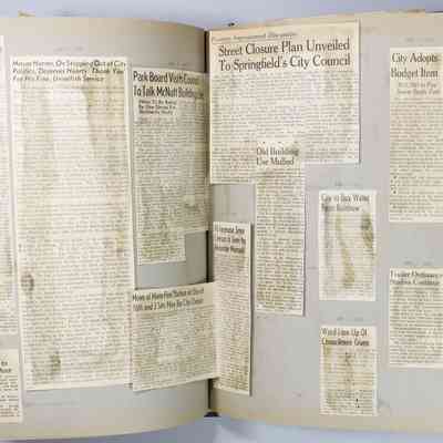 Pages 96-97 loose newspaper clipping
