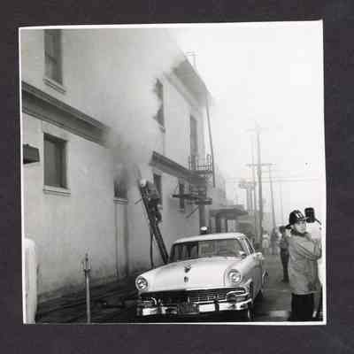 Photograph of Building on Fire and Firefighters, Undated