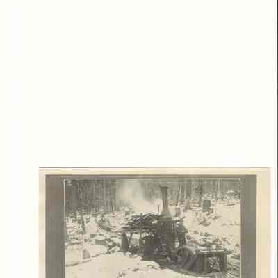 Photograph of a unknown man with a steam donkey on a sled at Prune Hill, 1899