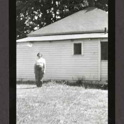 Photograph of a Wooden frame house, date unknown