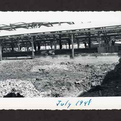 Photograph of drainage or filling of the old log pond at Booth-Kelly Lumber Mill