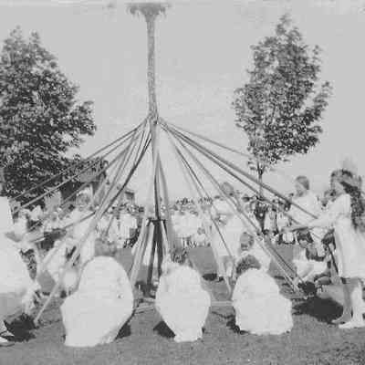 Photograph of girls around maypole, May Day at Lincoln School #10. 1921.