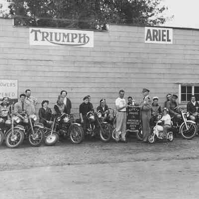 Photograph of motorcycles receiving a Safety Award by the American Motorcycle Association, 1951