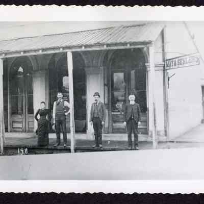Photograph of people outside of "May & Sengers," Undated