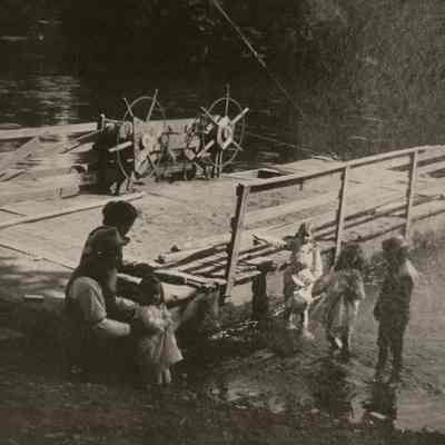 Photograph of a Family playing in the water, Undated