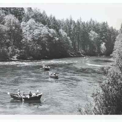 Photograph of boats participating in the McKenzie River White Water Parade, circa 1969