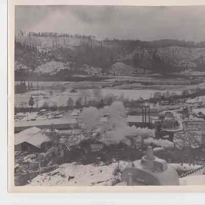 Photograph of Fischer Lumber Company covered in snow, Marcola, Oregon
