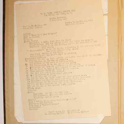 Loose materials inside first page of scrapbook