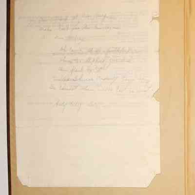 Loose materials inside first page of scrapbook