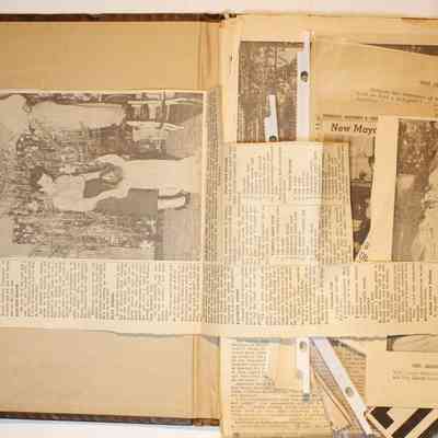 Loose materials inside first page of scrapbook