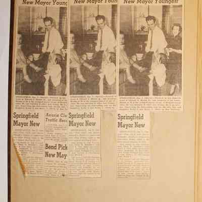 Loose materials inside first page of scrapbook