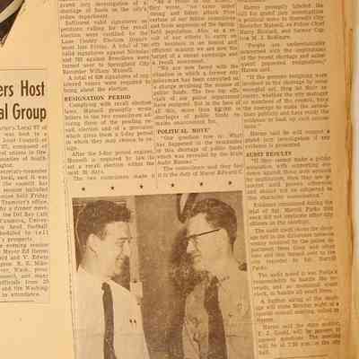 Page 13, unfolded newspaper clippings