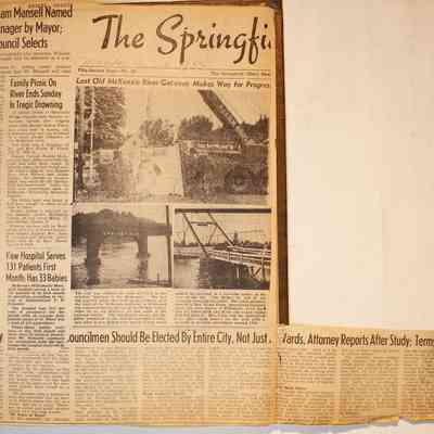 Page 21, unfolded newspaper clippings