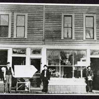 Photograph of Tailor-Made Suits, and Signs, Springfield, Oregon, Undated