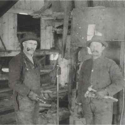 Photograph of J. Wilson & H. Beadle at work, circa before 1902