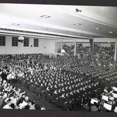 Photograph of Graduation with multiple unknown people, date unknown