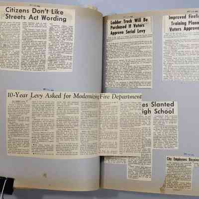 Pages 66-67 newspaper clipping unfolded