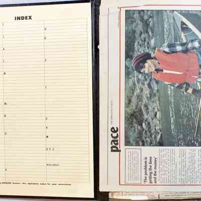 Inside Cover and Page 1 with loose newspaper