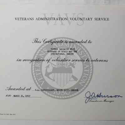Award in folder in-between pages 77 and 72