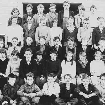 Photograph of older students with male teacher, Springfield, Oregon, date unknown.