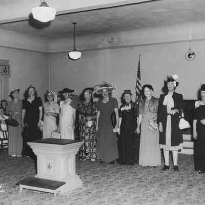 Photograph of ten men dressed as women at Masonic Lodge, date unknown