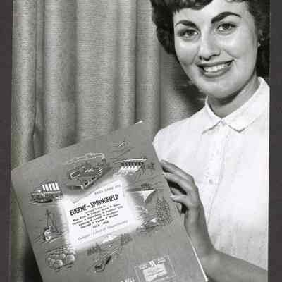 Photograph, Woman with Eugene-Springfield Phone Book, 1962