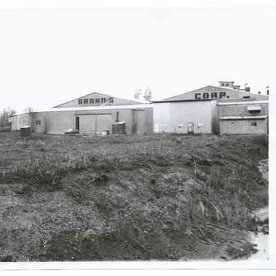 Photograph of "Brand's Corp." site and building, circa 1960