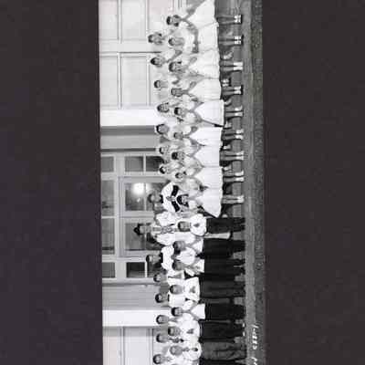 Photograph of a large group of children outside a church, Undated