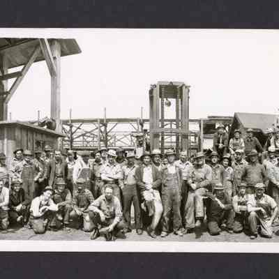 Photograph of a large Work Crew in front of Booth-Kelly Mill, Springfield, Oregon, undated