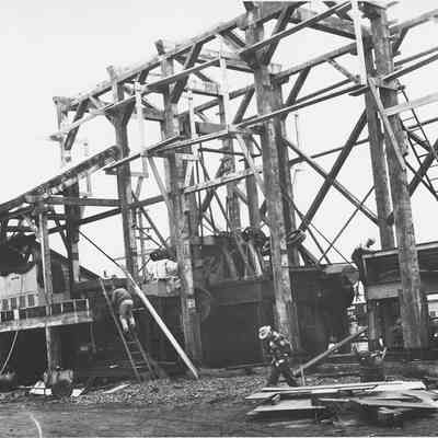 Photograph of Men working on BK Barker Building, 1956