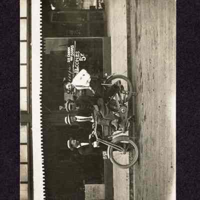 Postcard of 4 men around a motorcycle, Springfield, Oregon, Circa 1915