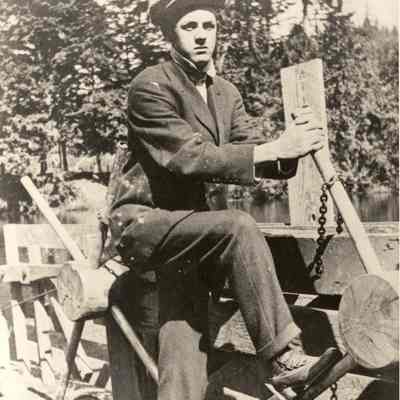 Photograph of Unknown man Operating a Ferry, Undated